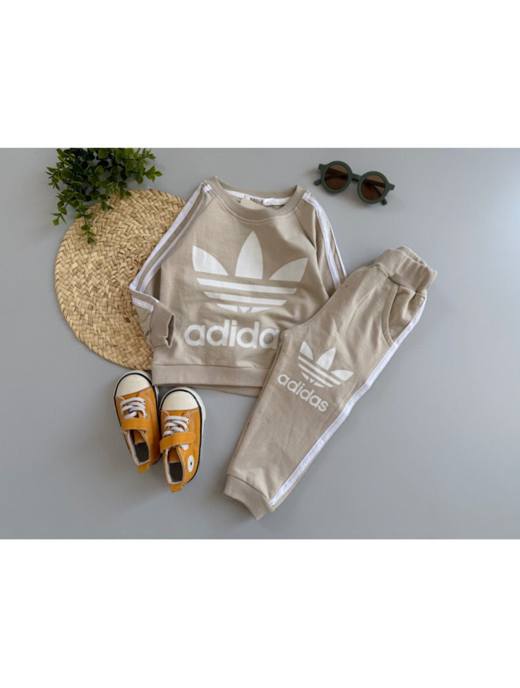 دوتیکه اسپرت کرمی آدیداس